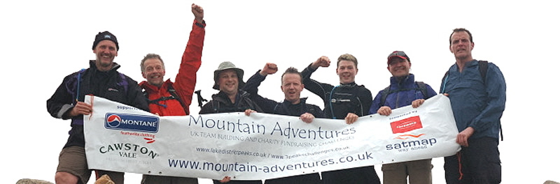 Jubilant 3 Peaks Team celebrate a speedy ascent of Scafell Pike - one more to go!